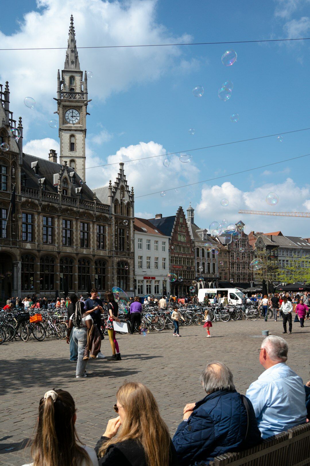 Business professionals networking at a community event in Belgium
